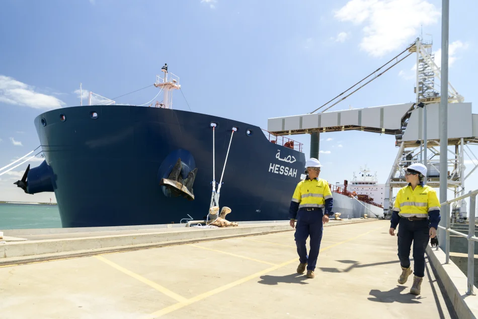 2 Viterra employees by a ship at Australian port terminal